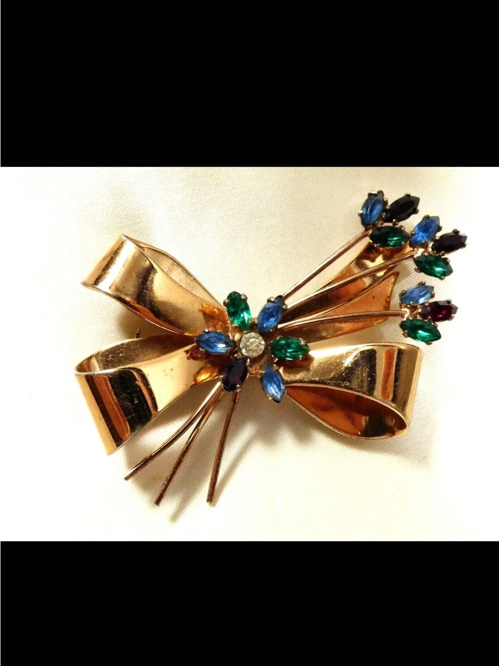 Coro Gold-Tone Bow Brooch with Blue, Green and Clear Stones
